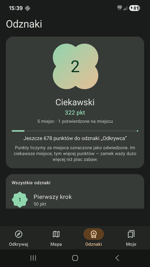 Ekran odznak z punktami i postępem do kolejnego progu